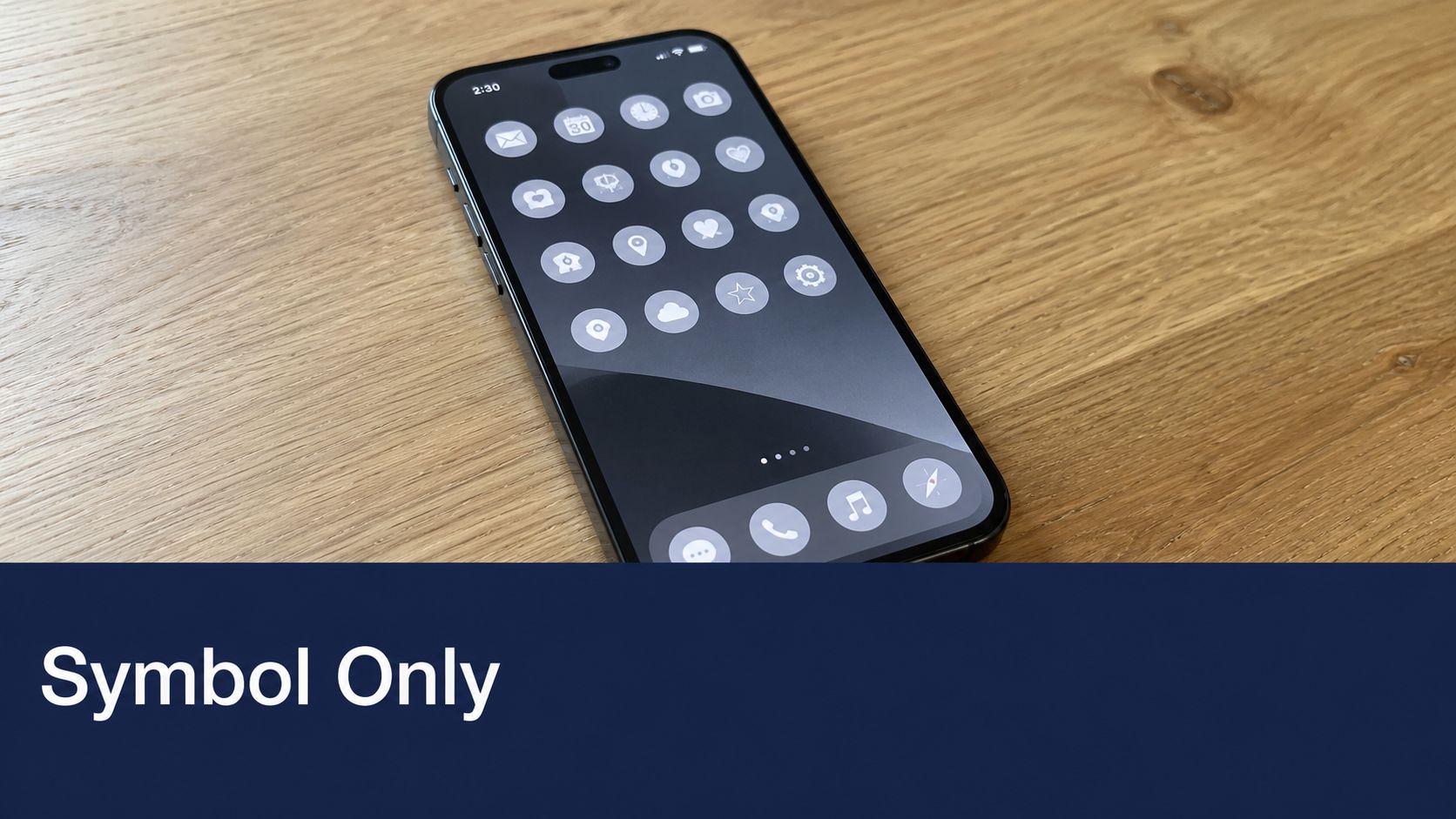 A modern smartphone showing a home screen with minimalist monochrome circular app icons on a wooden table.